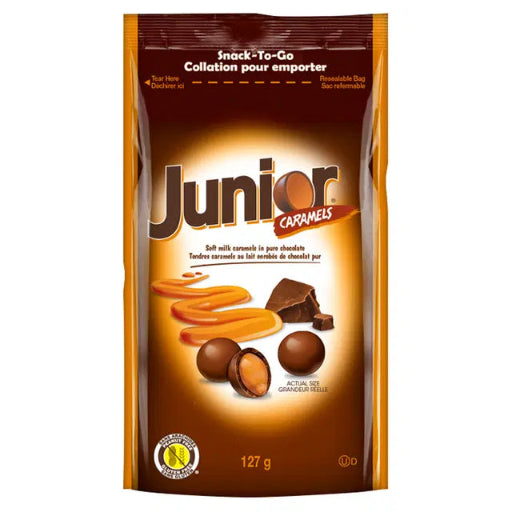 Packaging of Junior Caramels chocolate candies on a white background